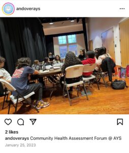 Screenshot of Instagram post from "andoverays." Image of young people gathered around a table with caption: Community Health Assessment Forum @ AYS. Dated January 25, 2023.